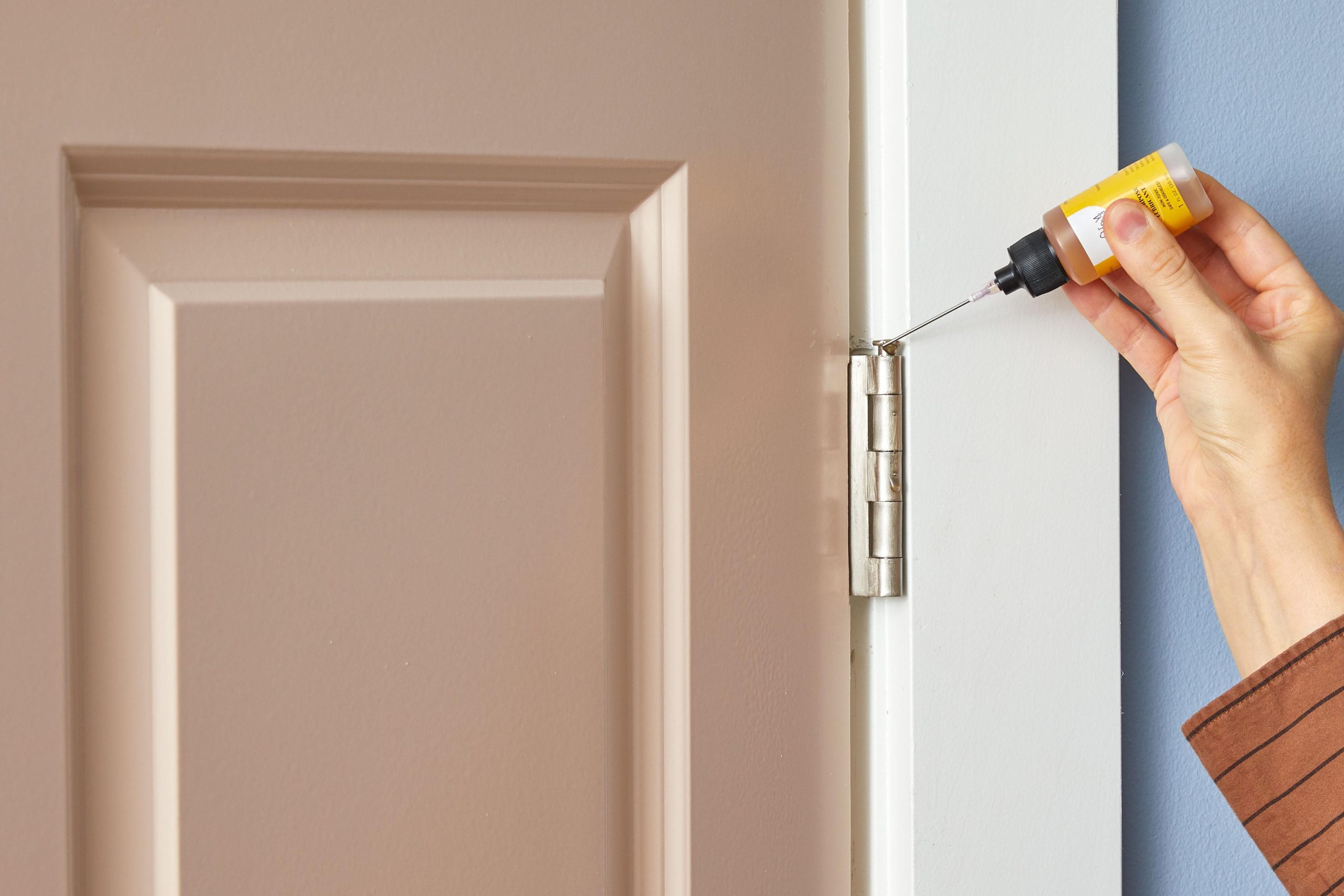 Fix a Squeaky Door in 30 Seconds (No Tools Needed!)